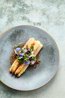 Asparagus with coffee, mascarpone and garden herbs