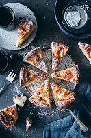 Simple sunken apple cake with icing sugar