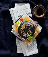 Black sesame bagel with mozzarella and roasted vegetables