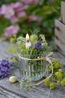 Small lantern filled with rosemary, thyme, nigella and meadow chervil