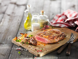 Ribeye steak medium roasted with sea salt, pepper and olive oil