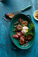 Grilled plums and burrata in spiced syrup with Iberico ham