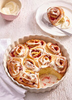 Sweet strawberry rolls with icing