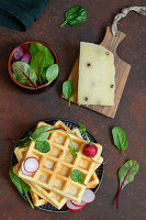 Waffles with pecorino al pepe, dill and fresh spinach