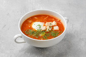 Tomato soup with chicken and sour cream