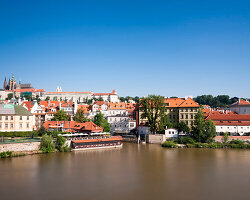 Cityscape and Vltava River with Prague Castle in background, Prague, Czech Republic