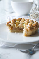 Small apple pie with pastry lattice