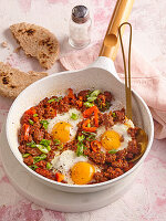 Egg pan with minced meat, peppers and spring onions