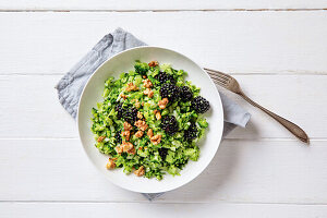 Broccoli salad with blackberries and walnuts