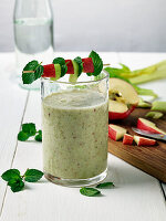 Green smoothie with apple, celery and mint