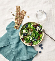 Leaf salad with blueberries and seed crisps