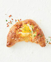 Croissant with egg and bacon filling