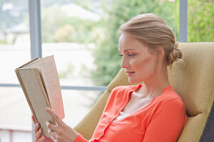 Young Woman Reading Book