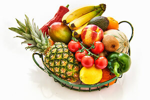 Basket with fresh fruit and vegetables