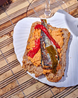 Sardine tartine with peppers and bread