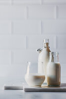 Various types of milk in glass containers