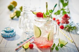 Summery raspberry and lime lemonade in a glass