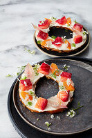 Pickled beetroot salmon on bagels with pickles