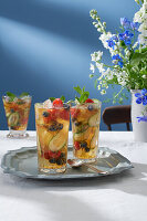 Lillet-Pimm's with cucumber, berries and mint