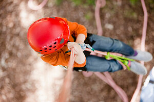 Climber dangling from a rope - high angle