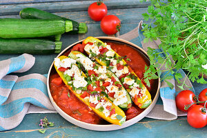 Stuffed courgettes with tomato sauce