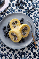 Sponge roll with blueberry and cream filling