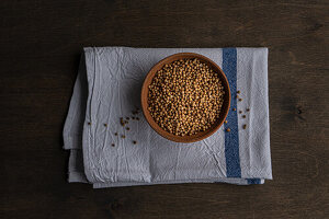 Bowl with coriander seeds