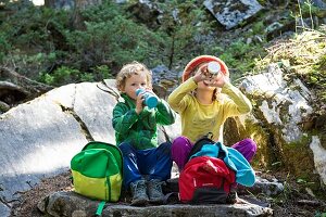 France, Savoie, Mountain of Vanoise, Pralognan la Vanoise, family, two children are dotted with gourds on the discovery trail in the wood of Gliere