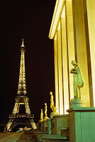 Iconic landmarks at night in Paris; Paris, France