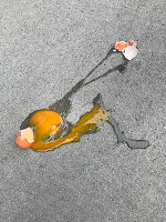 Broken egg on the sidewalk