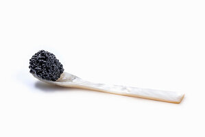 Vegan seaweed caviar on mother-of-pearl spoon