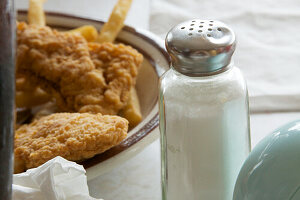 Salt with chicken nuggets and chips