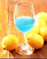 Cocktail blue devil gin with lemon juice maraschino liqueur and blue curacao