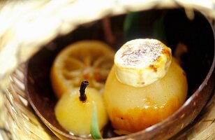 Poached pears gratinated with goat's cheese