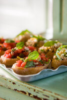 Diced tomatoes and tuna Crostinis