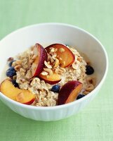 Porridge with nectarines,blueberries and hazelnuts