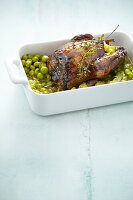 Caramelized pigeon with peas