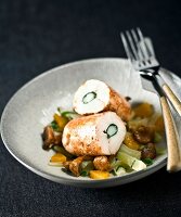 Chicken breast stuffed with langoustine on chanterelle ragout with chard and oranges