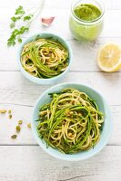Linguine with thin strips of courgettes and parsley-pistachio pesto