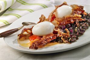 Soft-boiled egg with stewed red onions