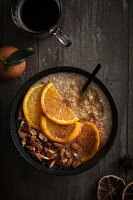Porridge with almonds,confit oranges and raspberries