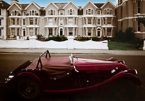 Vintage car in front of terrace houses, Torquay, Devon, Southern England, Great Britain, Europe