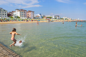 Holiday makers on the beach, Jesolo, Veneto, Adriatic, Italy