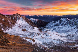 View from the Pfunderer Mountains in the direction towards Eisack Valley and Dolomites, Unesco world heritage, shortly after sunset, South Tyrol, Italy