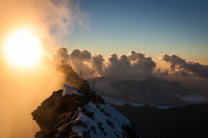 Mountaineer at summit, Matterhorn, Zermatt, Switzerland.