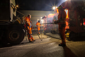 Night construction site A2, Hanover, express redevelopment, construction workers during roadway redevelopment, rutting removal, German autobahn,