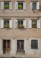 Facade of houses in Muggia, Friuli Venezia Giulia, Italy.