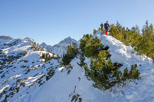 Snowshoe hikers on the Lumberger Grat, Tannheimer Berge, Allgäu, Tirol, Austria