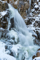 Frozen waterfall in the mountains near Garmisch-Partenkirchen, Upper Bavaria, Germany.