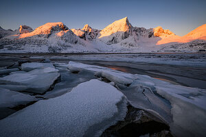  Icy sunrise at the fjord, Lofoten, Norway 